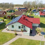 Hébergement de vacances Kinderfreundliches 5 Personen Wellnessferienhaus Treibholz Mit Zwei Duschen Und Toiletten, Sauna, Whirlpool, Kaminofen, Wintergarten Und Kanu In Otterndorf