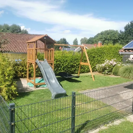 Kinderfreundliches 5 Personen Wellnessferienhaus Treibholz Mit Zwei Duschen Und Toiletten, Sauna, Whirlpool, Kaminofen, Wintergarten Und Kanu In Hébergement de vacances Otterndorf