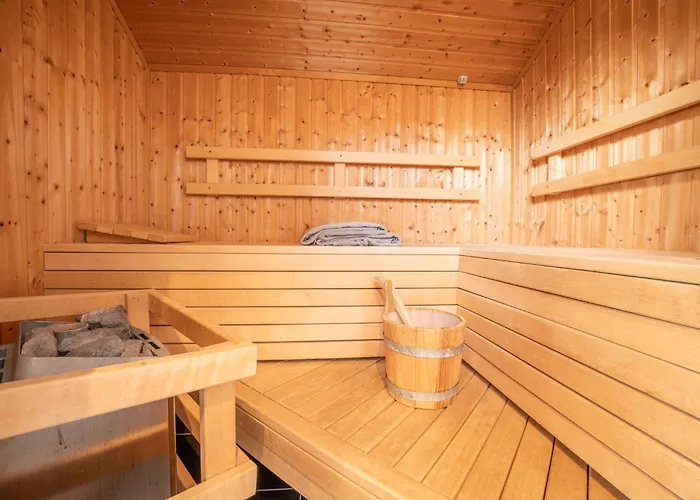Σπίτι διακοπών Kinderfreundliches 5 Personen Wellnessferienhaus Treibholz Mit Zwei Duschen Und Toiletten, Sauna, Whirlpool, Kaminofen, Wintergarten Und Kanu In Otterndorf