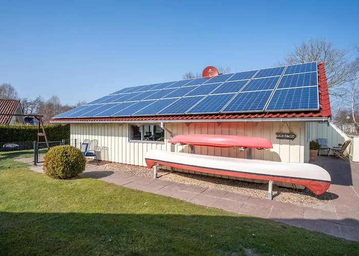 Kinderfreundliches 5 Personen Wellnessferienhaus Treibholz Mit Zwei Duschen Und Toiletten, Sauna, Whirlpool, Kaminofen, Wintergarten Und Kanu In Σπίτι διακοπών Otterndorf