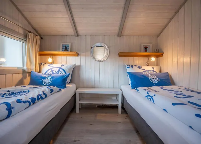 Σπίτι διακοπών Kinderfreundliches 5 Personen Wellnessferienhaus Treibholz Mit Zwei Duschen Und Toiletten, Sauna, Whirlpool, Kaminofen, Wintergarten Und Kanu In Otterndorf