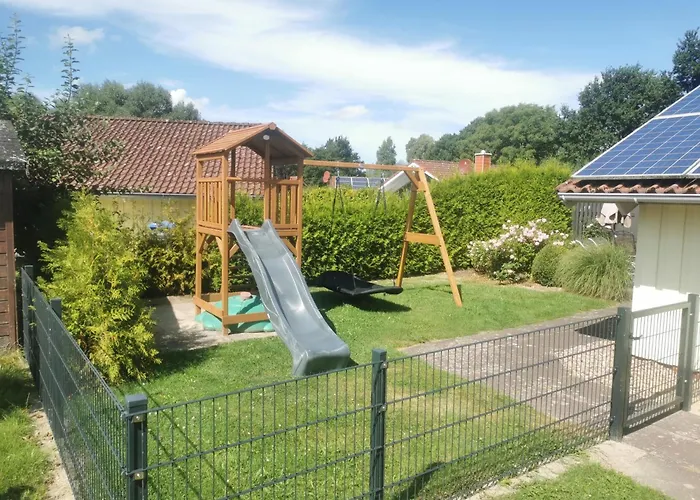Σπίτι διακοπών Kinderfreundliches 5 Personen Wellnessferienhaus Treibholz Mit Zwei Duschen Und Toiletten, Sauna, Whirlpool, Kaminofen, Wintergarten Und Kanu In Otterndorf