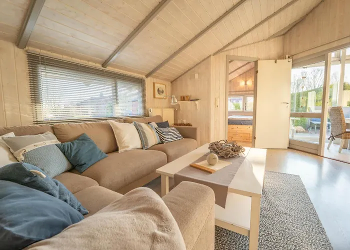 Σπίτι διακοπών Kinderfreundliches 5 Personen Wellnessferienhaus Treibholz Mit Zwei Duschen Und Toiletten, Sauna, Whirlpool, Kaminofen, Wintergarten Und Kanu In Otterndorf