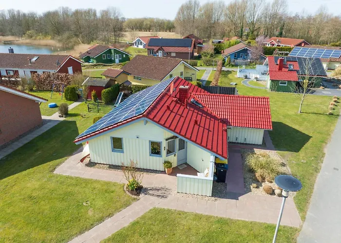 Σπίτι διακοπών Kinderfreundliches 5 Personen Wellnessferienhaus Treibholz Mit Zwei Duschen Und Toiletten, Sauna, Whirlpool, Kaminofen, Wintergarten Und Kanu In Otterndorf